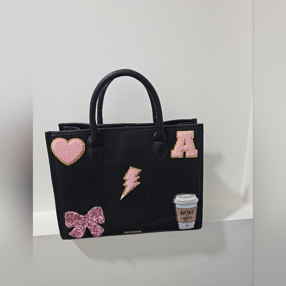 like dreams Handbags - Like Dreams Black Tote with Pink Patch Details